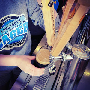 Pouring a Longtooth Stout from a tap